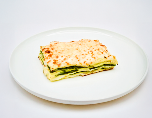 Spinach Lasagna — Fresh pasta sheets, béchamel sauce, ricotta, spinach, mozzarella and Parmesan.